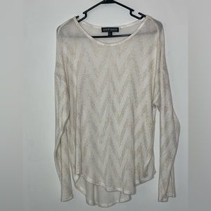 White & gold sweater